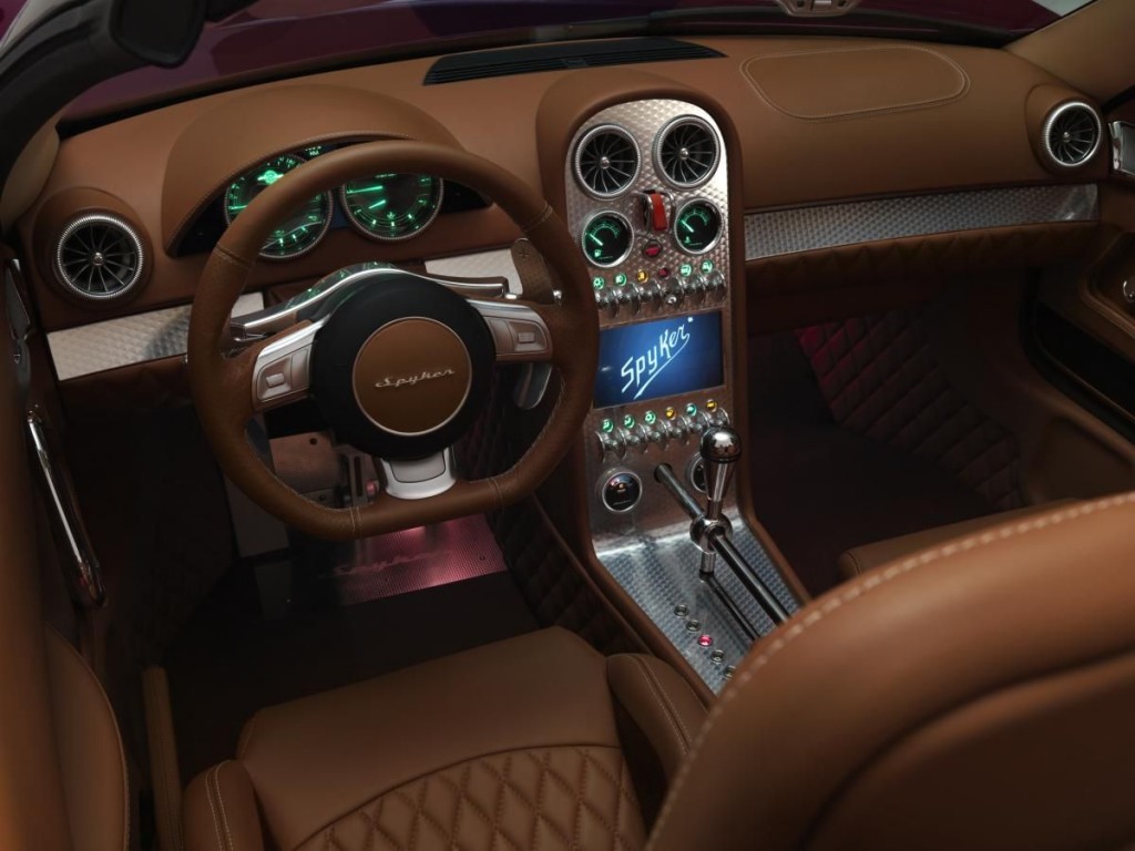 Interior surroundings crafted from the finest materials are unusually open and airy for a sports car, akin to an aeroplane cockpit. 